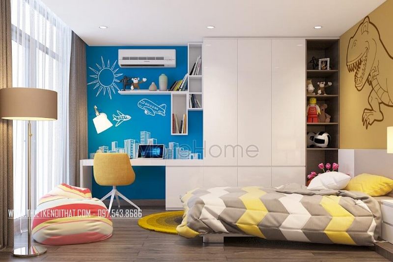 Hệ tủ quần áo hiện đại được thiết kế nối liền với bàn học, tạo hiệu ứng cho căn phòng thêm rộng rãi hơn